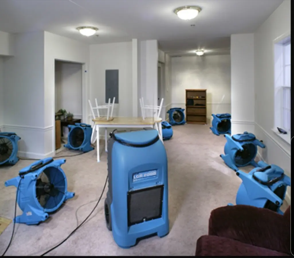 Air movers and dehumidifier setup for Water Damage Restoration in Durango